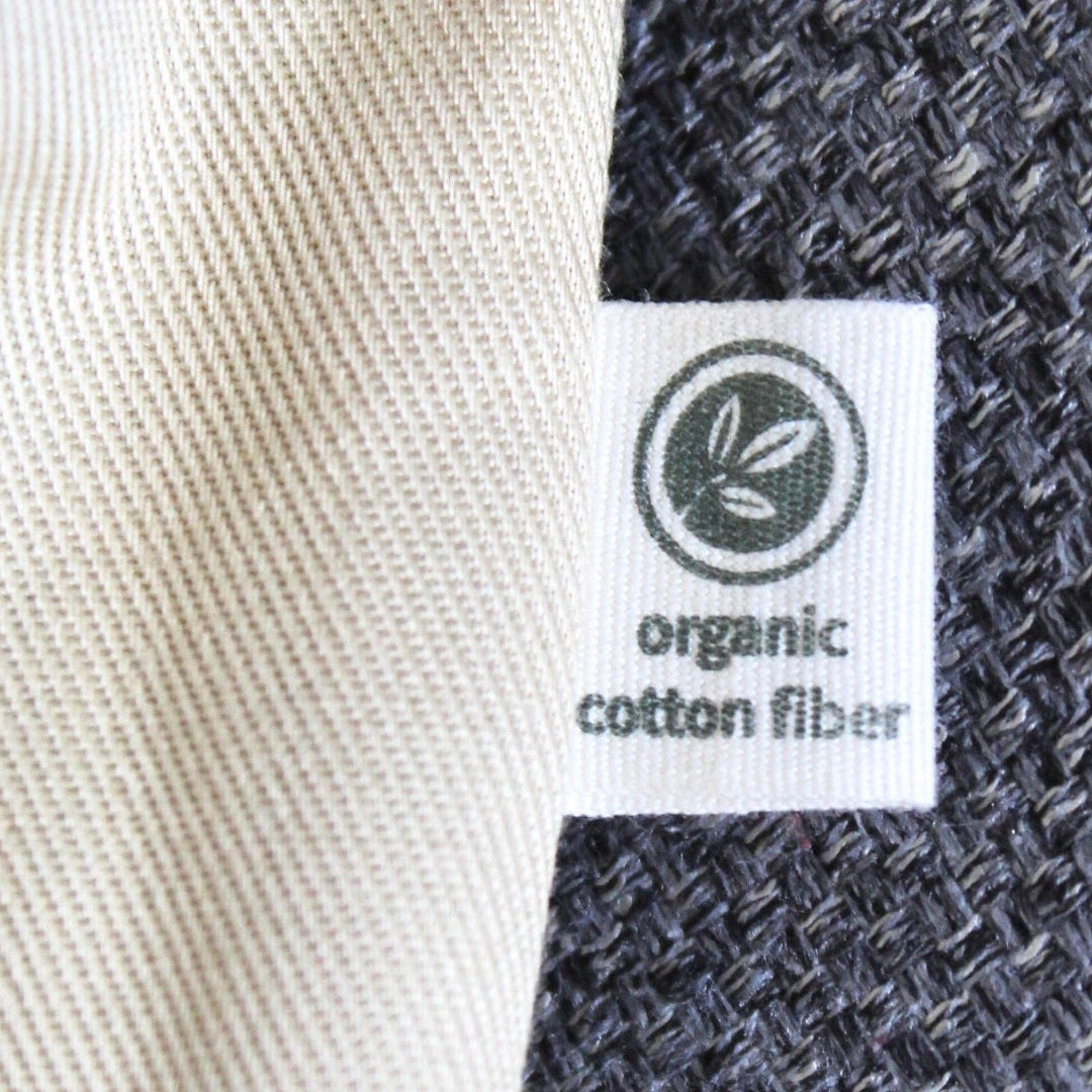 Close-up of organic cotton fiber label on fabric