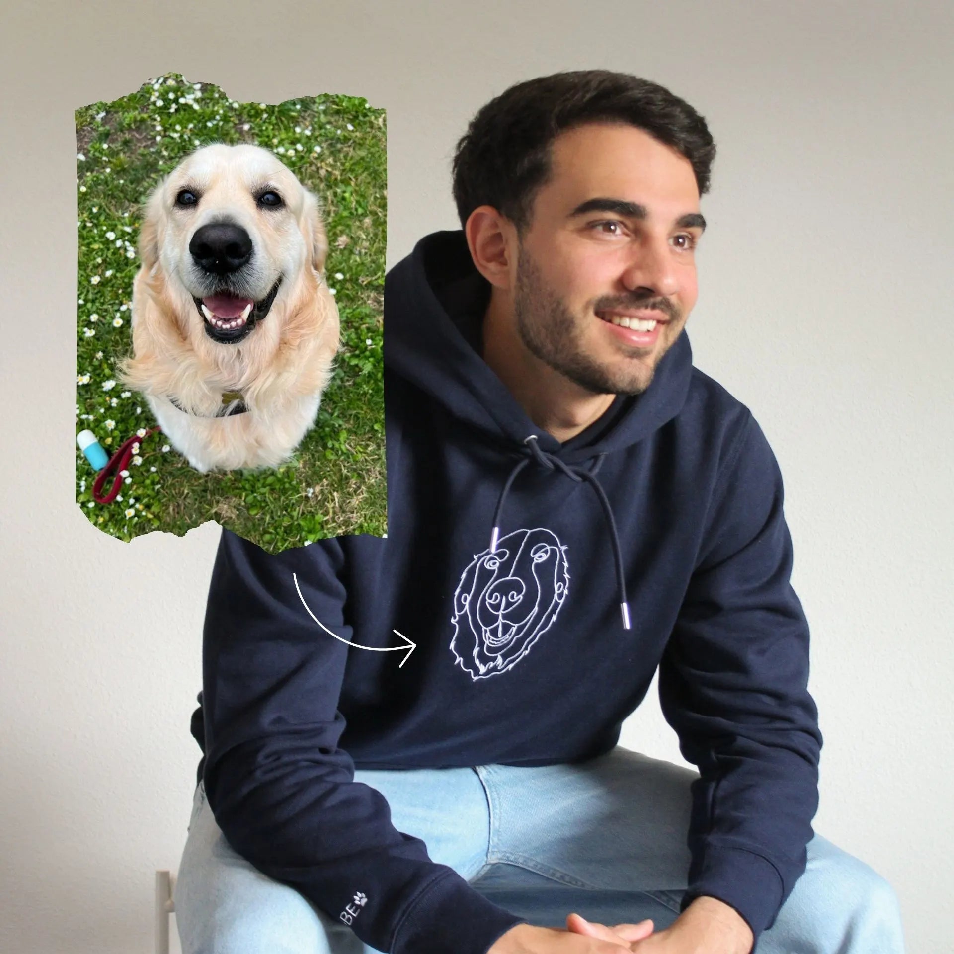 Man wearing a navy blue hoodie with a logo, sitting next to an inset photo of a dog on a grassy background.